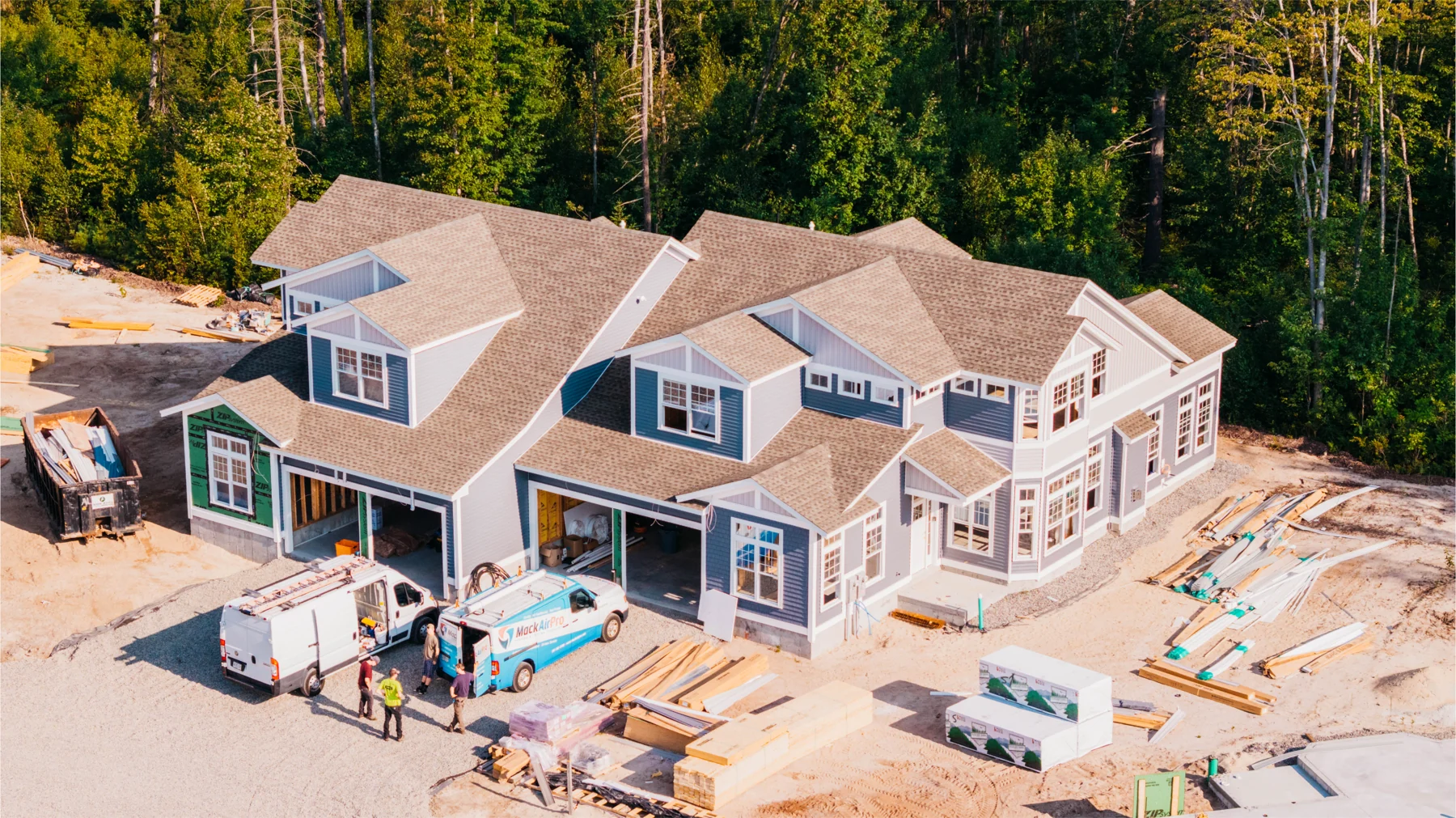 Aerial photograph documenting residential construction and exterior progress