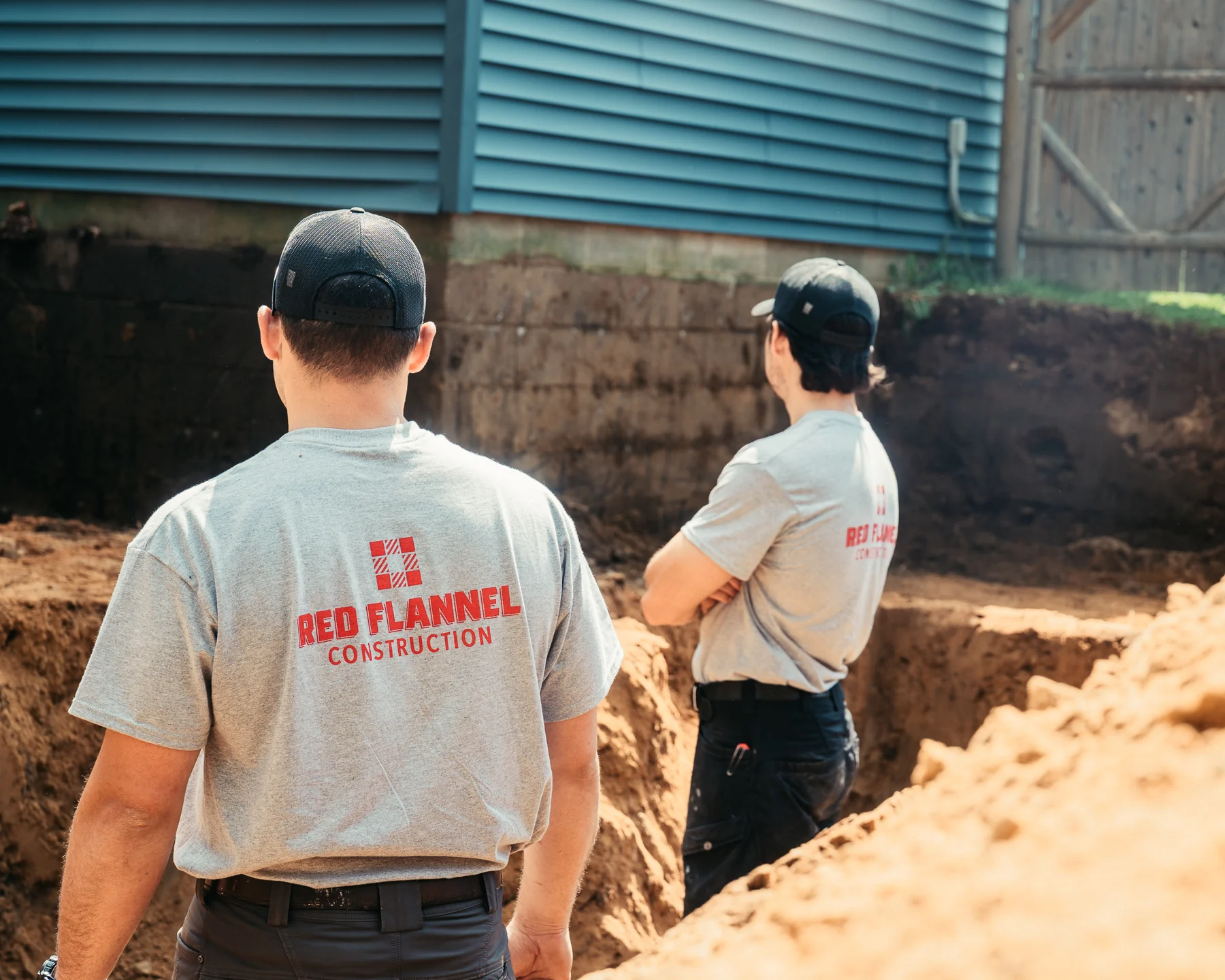 Red Flannel crew reviewing a residential jobsite